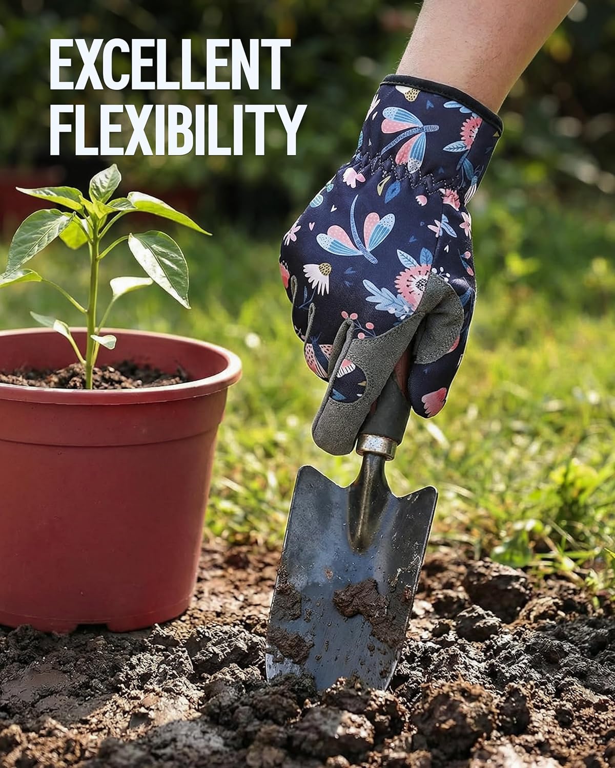 Floral gardening gloves with padded palms worn for weeding in outdoor soil.