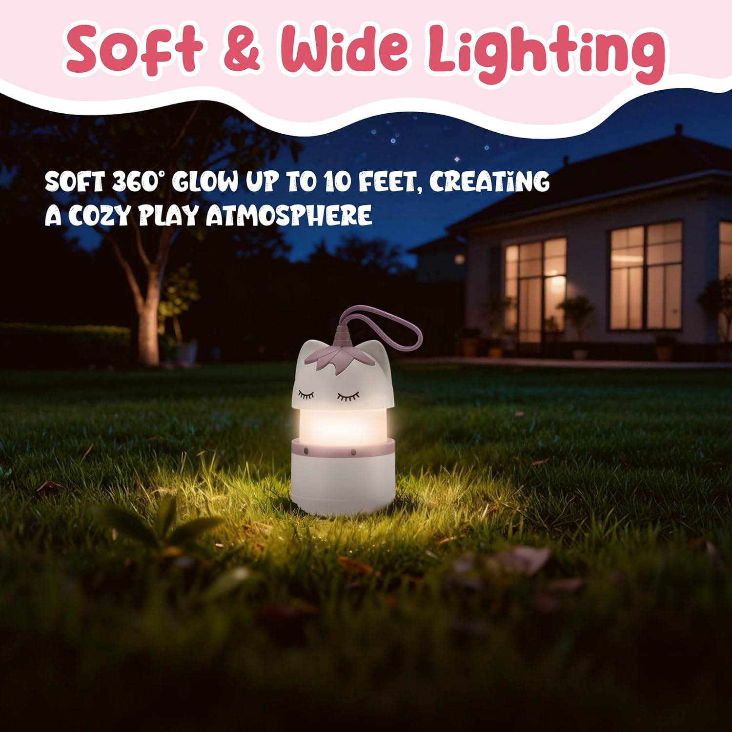 Unicorn kids lantern standing on grass at night with soft warm light, lanyard loop handle