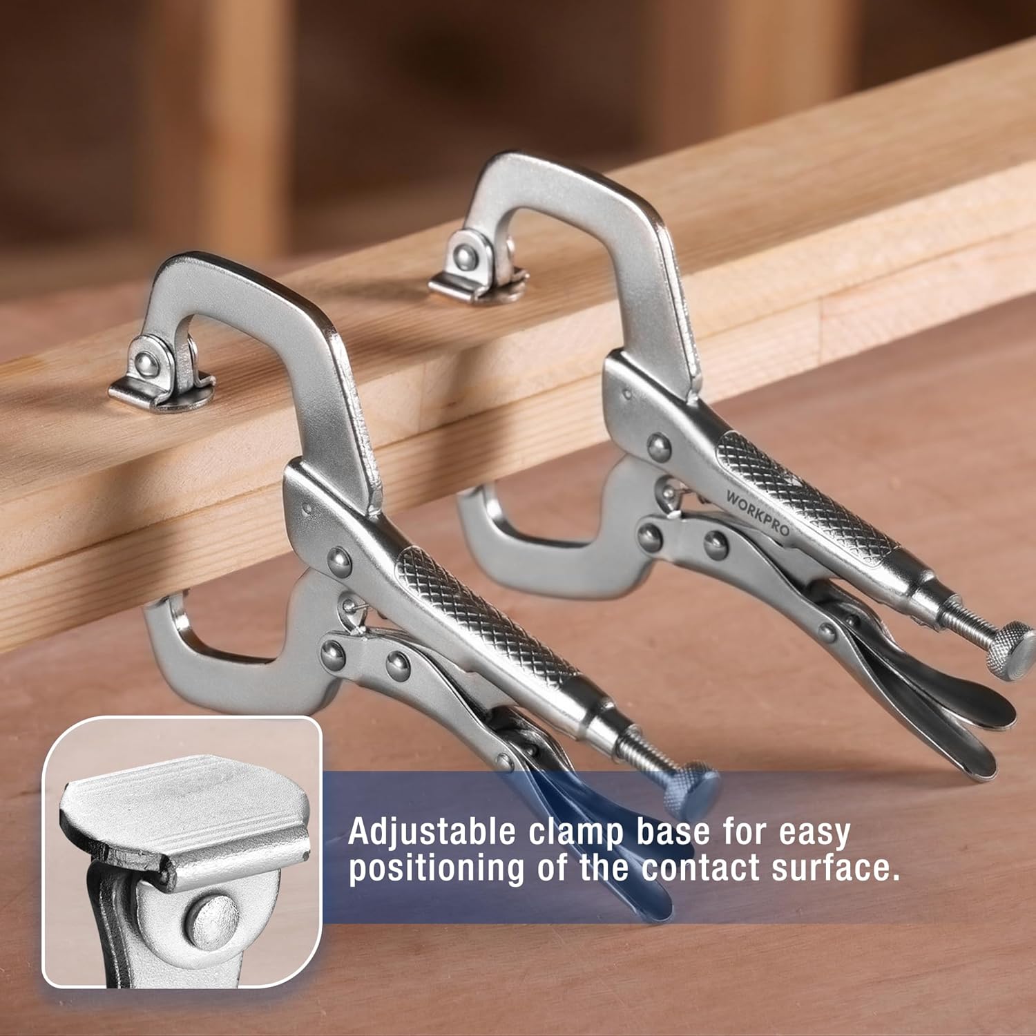 Two swivel-pad C-clamps locking onto a wooden beam, adjustable screw, gray steel jaws