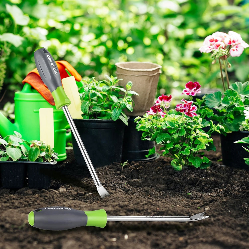 WORKPRO two-pronged fork weeder tool with soft grip beside potted flowers