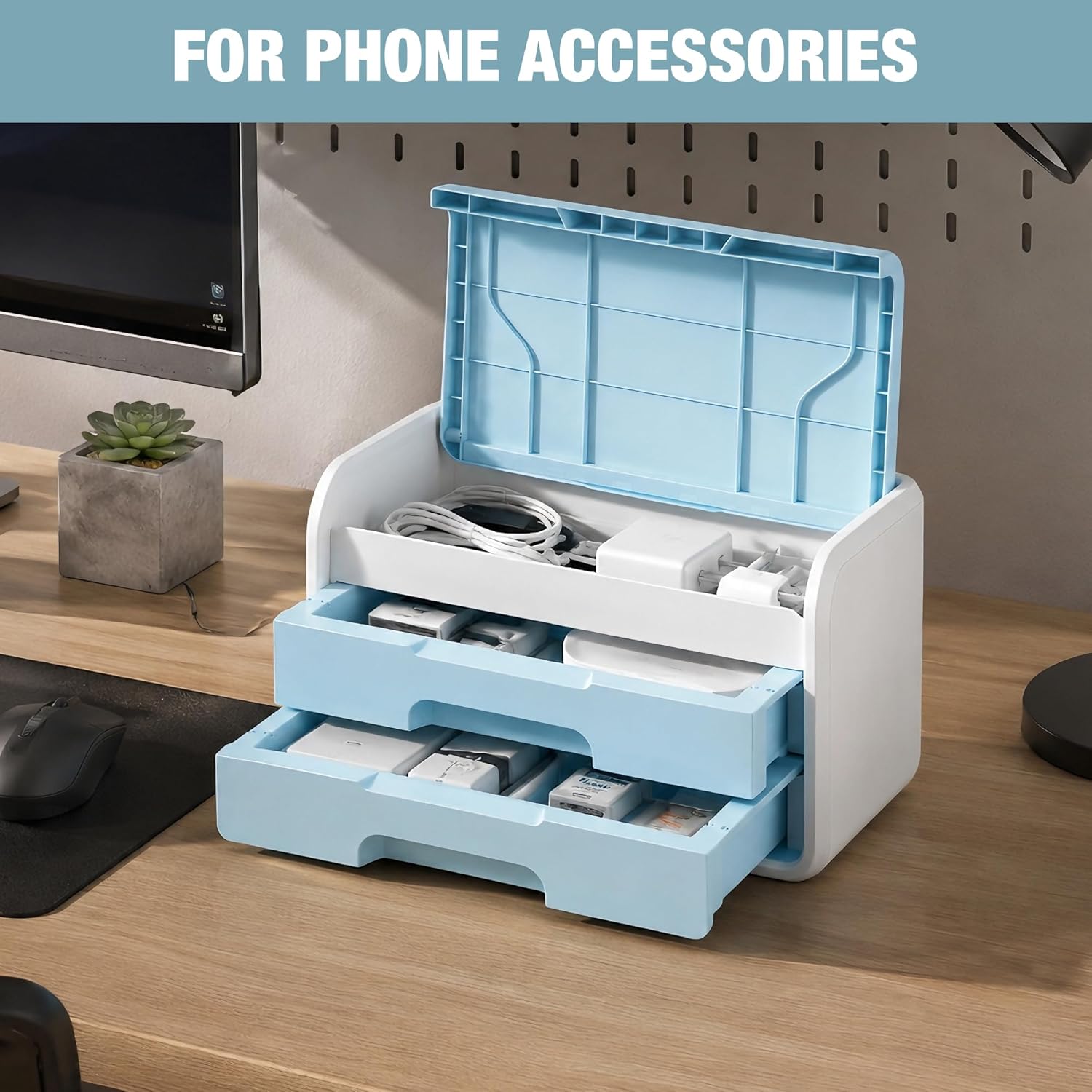 Blue-and-white flip-top organizer with two drawers for phone accessories and cables