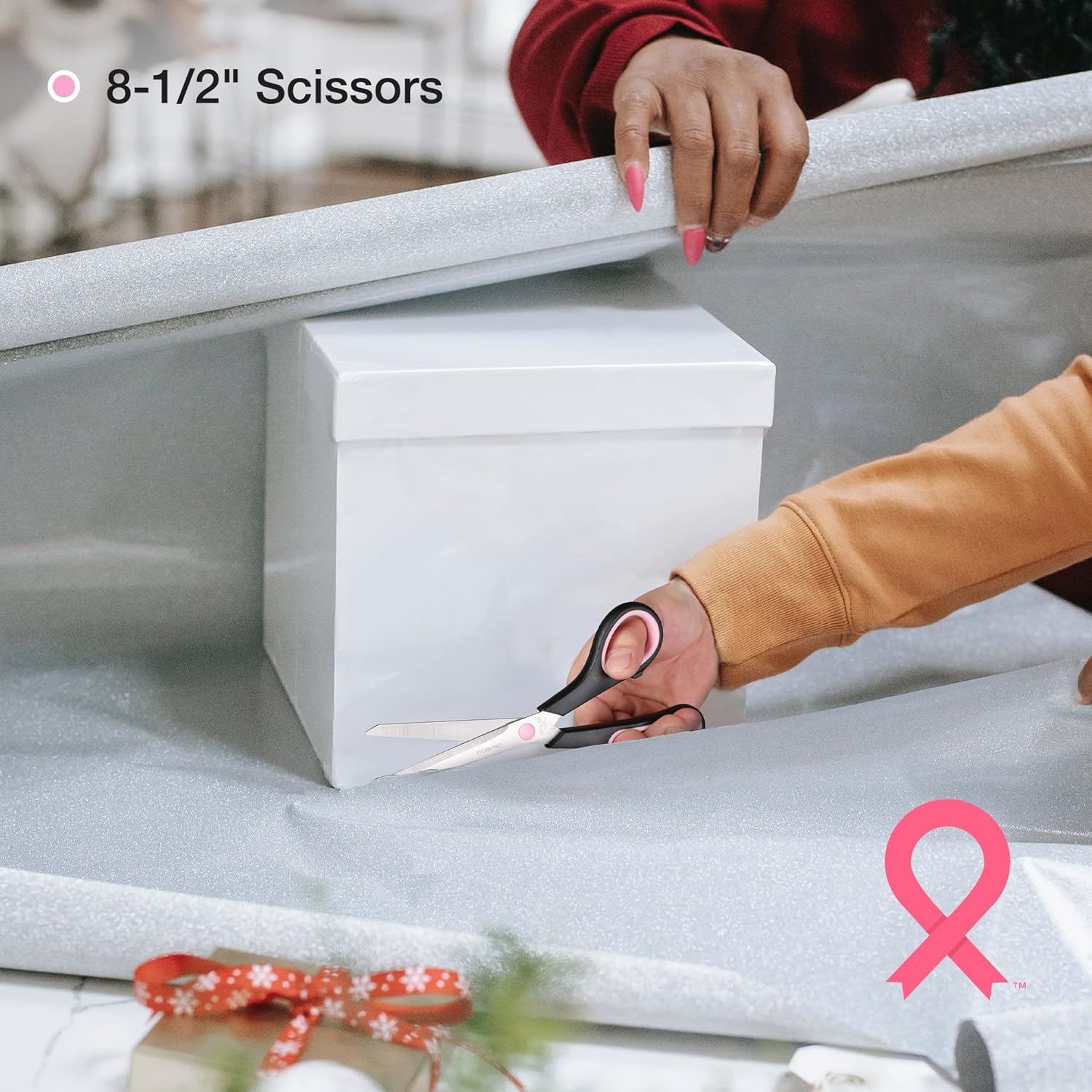 Pink-handled 8-1/2 in scissors from a pink tool set cutting material