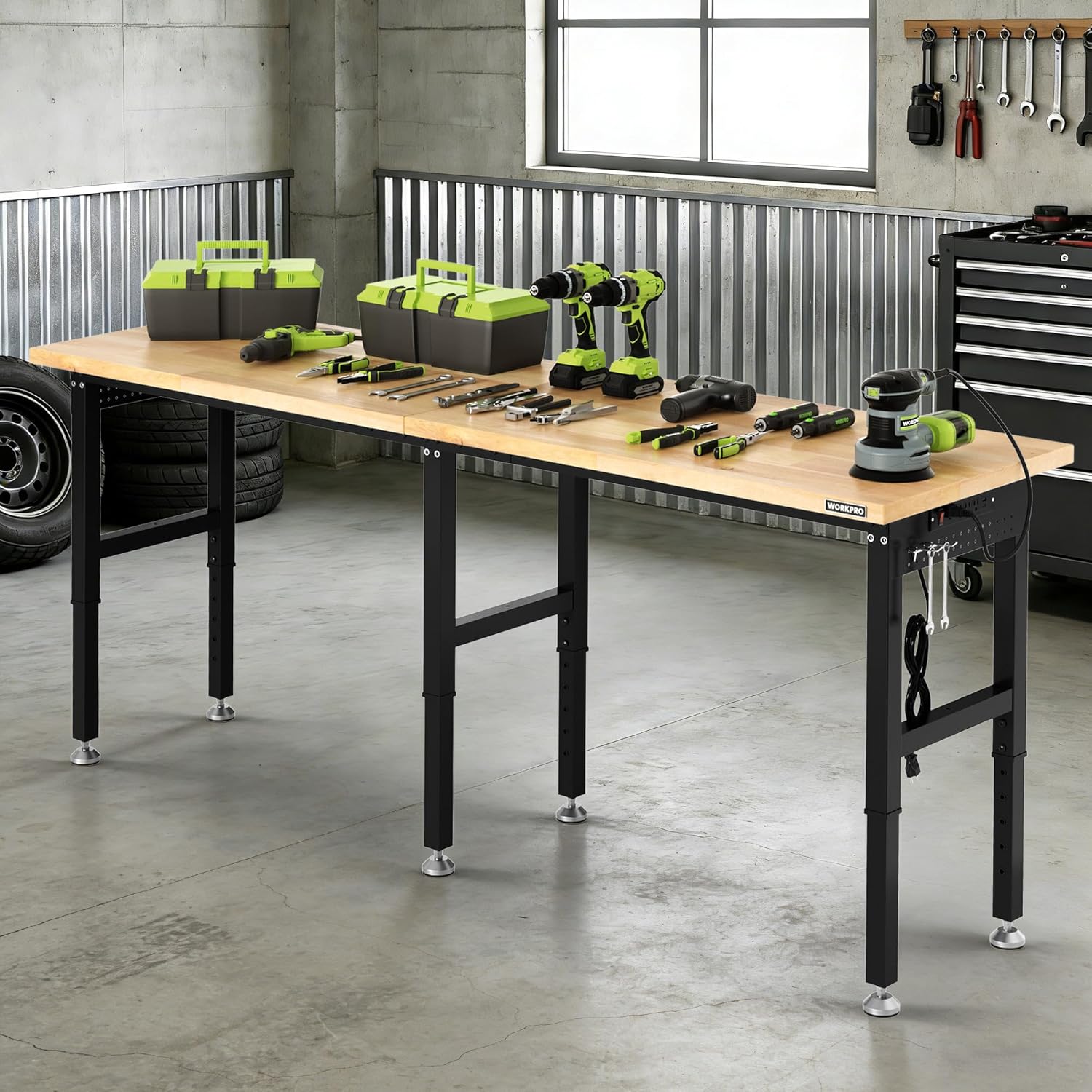 Large workshop workbench with light wood top, pegboard, and black adjustable base