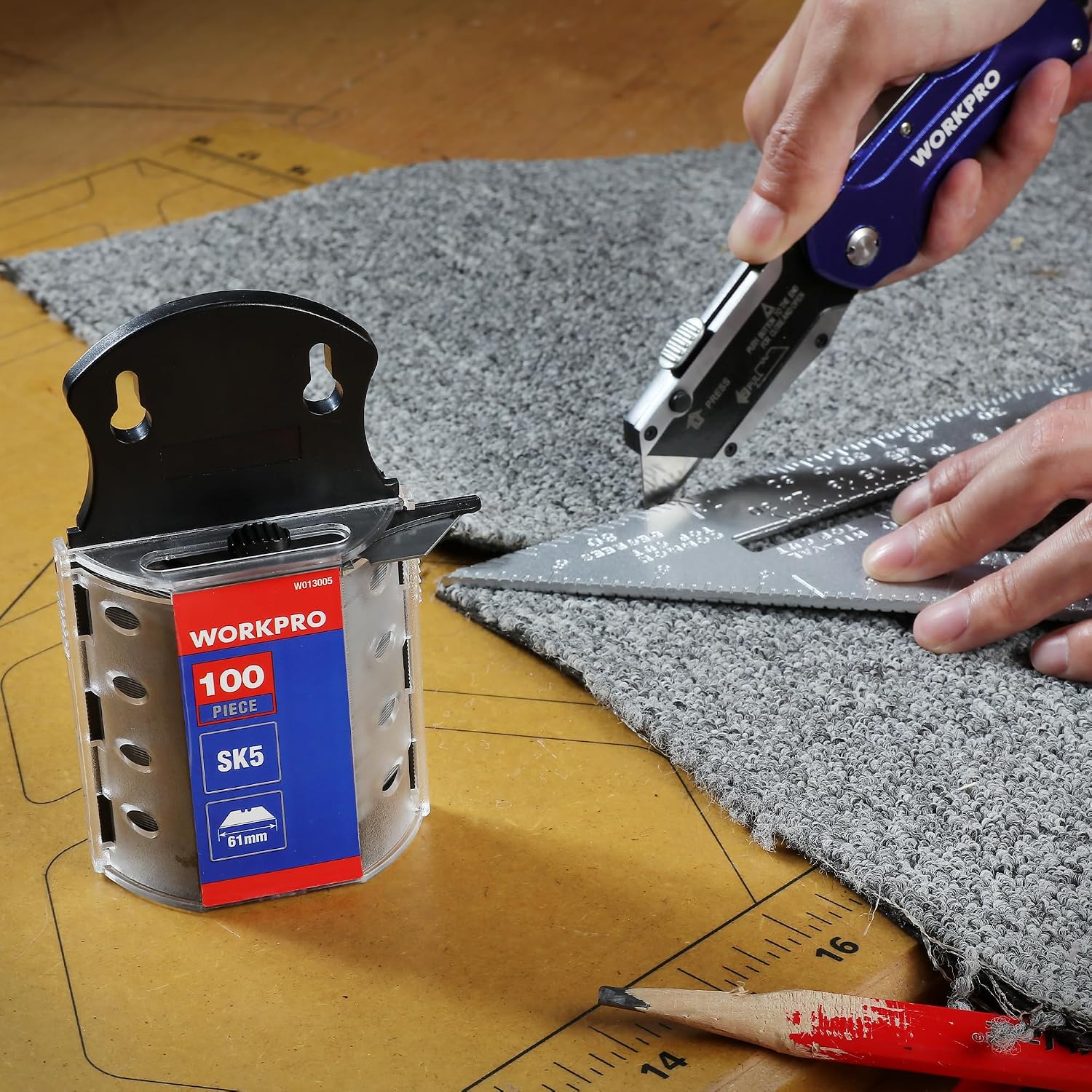 Utility knife blade dispenser and utility knife cutting carpet, SK5 blade installed