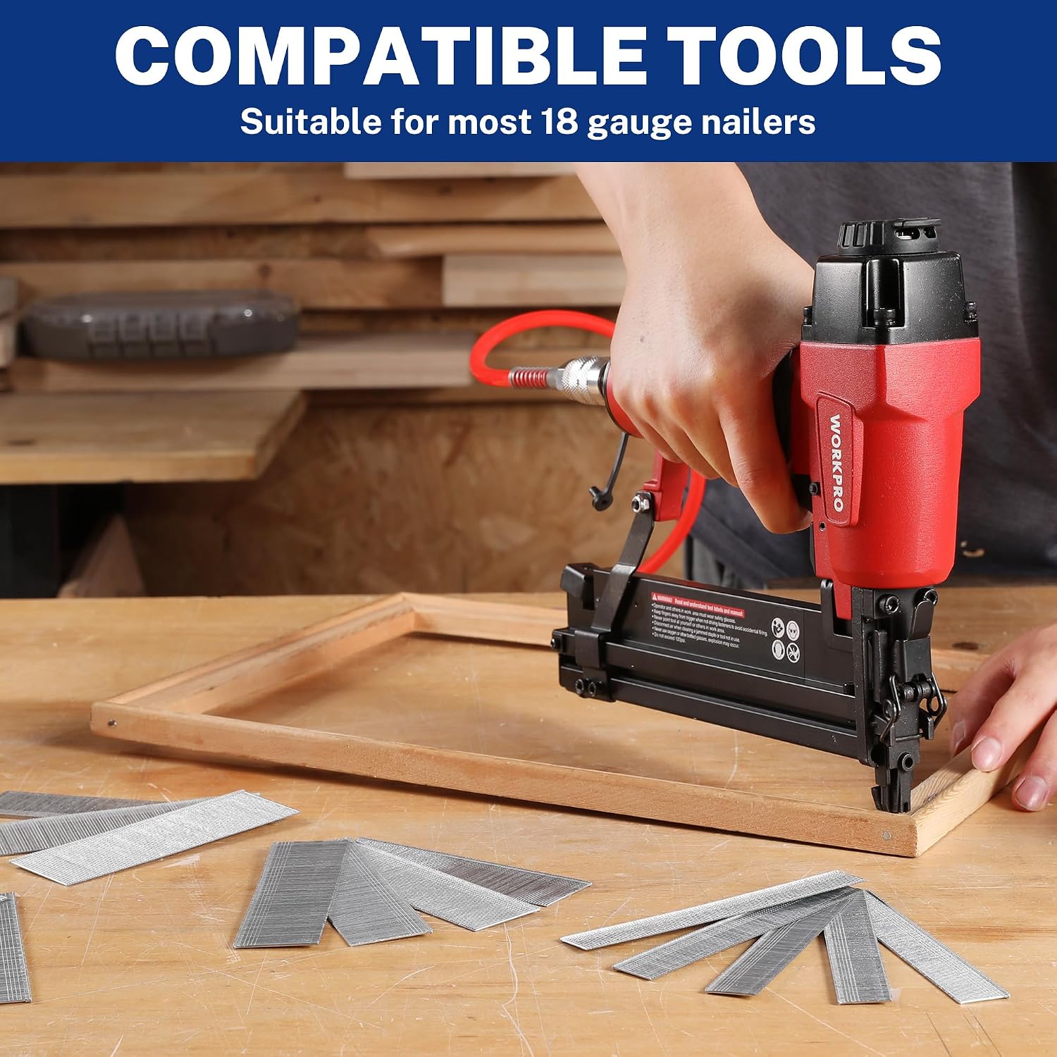 18 gauge brad nails on metal strips near a pneumatic brad nailer