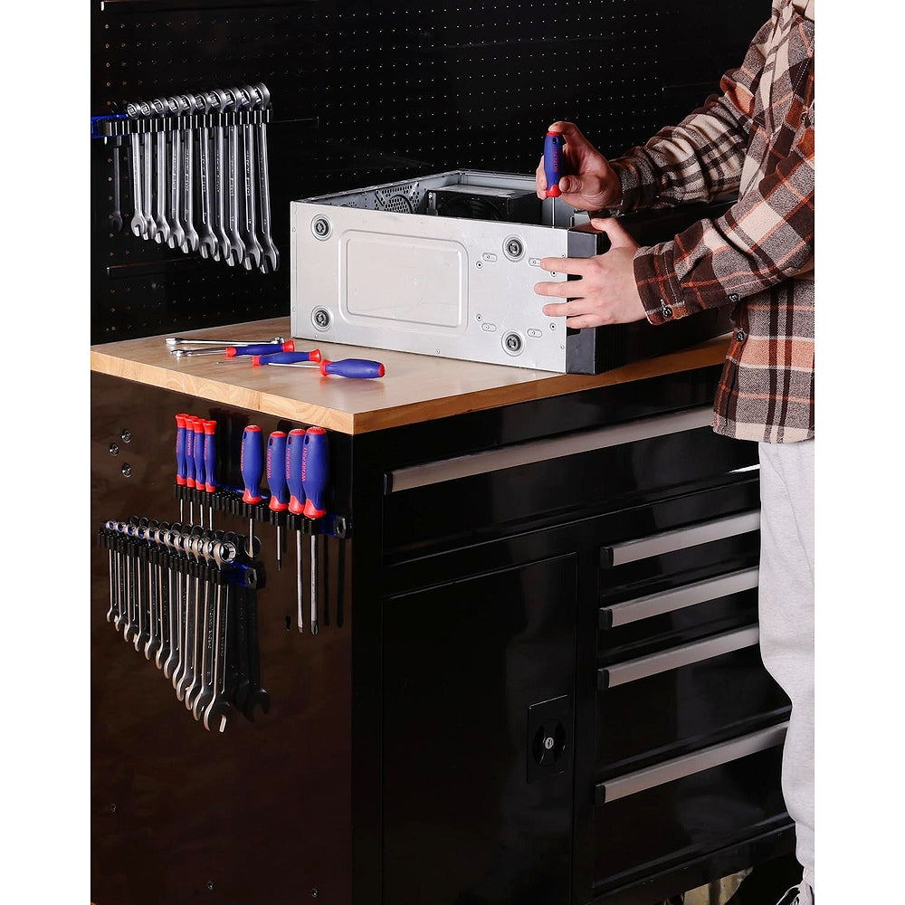 Magnetic tool organizer panel with blue tool holders and screwdriver/wrench slots on cart