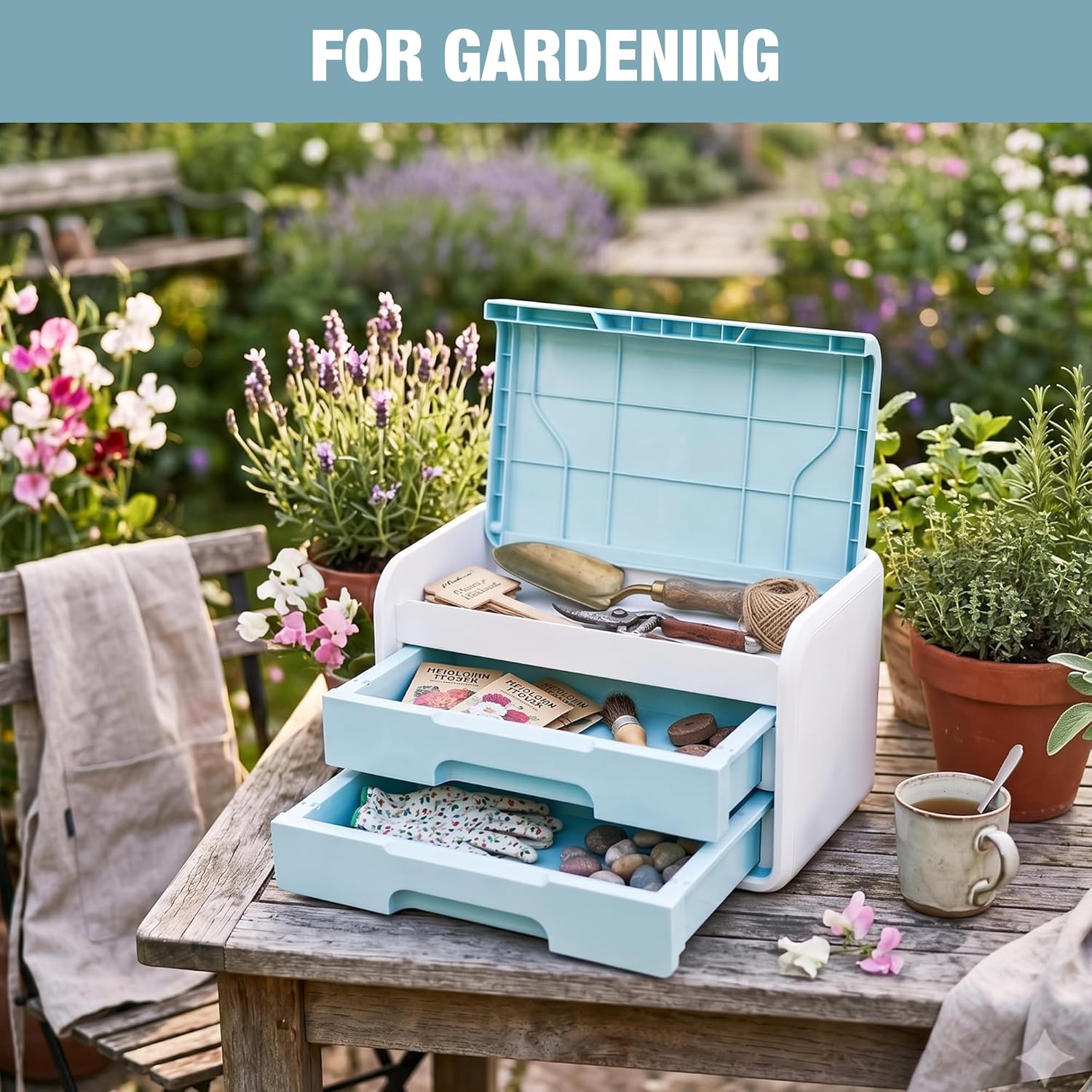 Blue and white flip-top desktop organizer box with two drawers, gardening items inside
