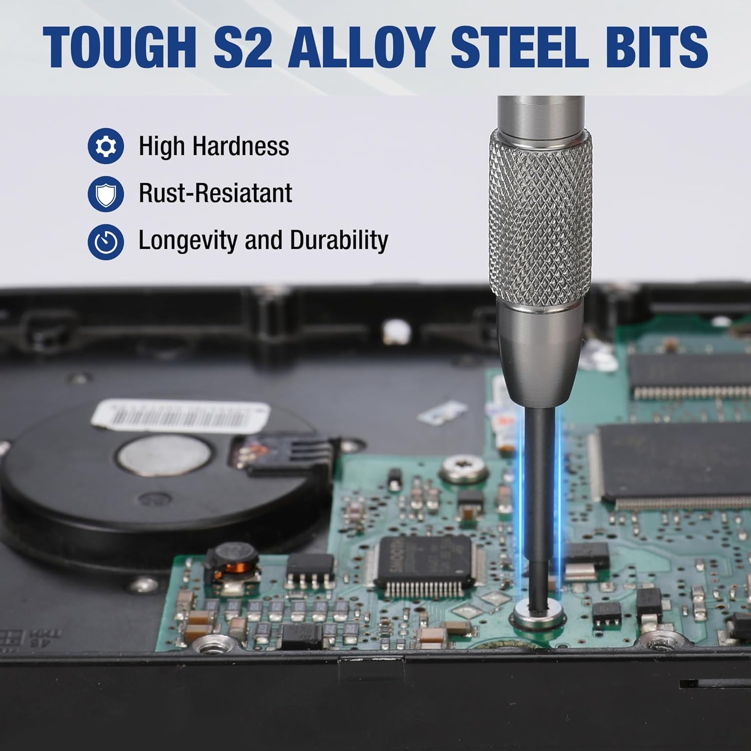 Precision magnetic screwdriver with textured grip and metal tip, positioned over an electronic circuit board