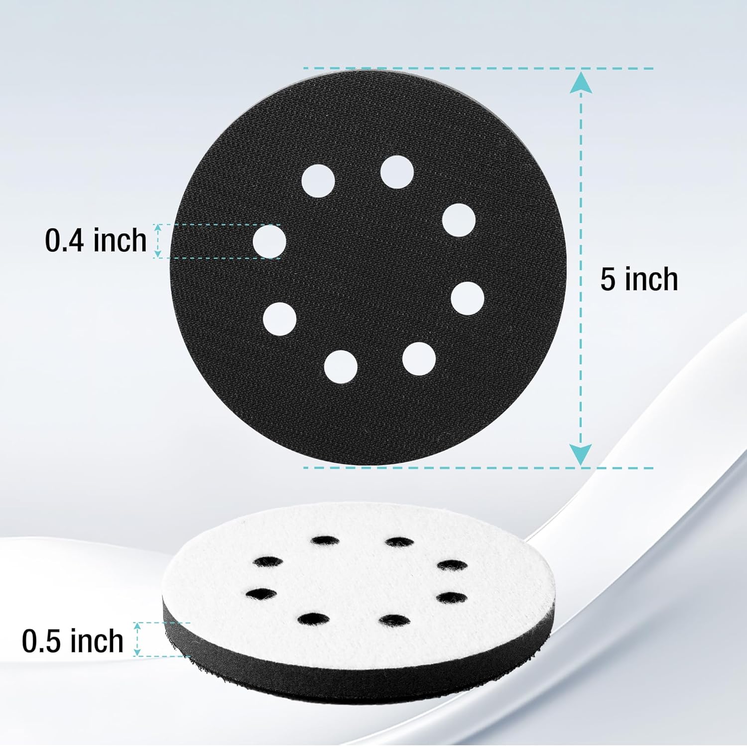 Round sanding discs: black and white foam with evenly spaced dust holes