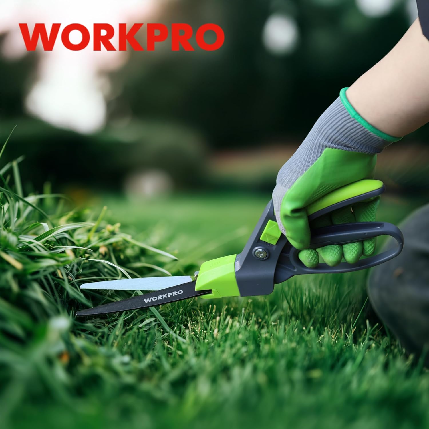 WORKPRO handheld grass clippers with green gloves and black-and-green handle