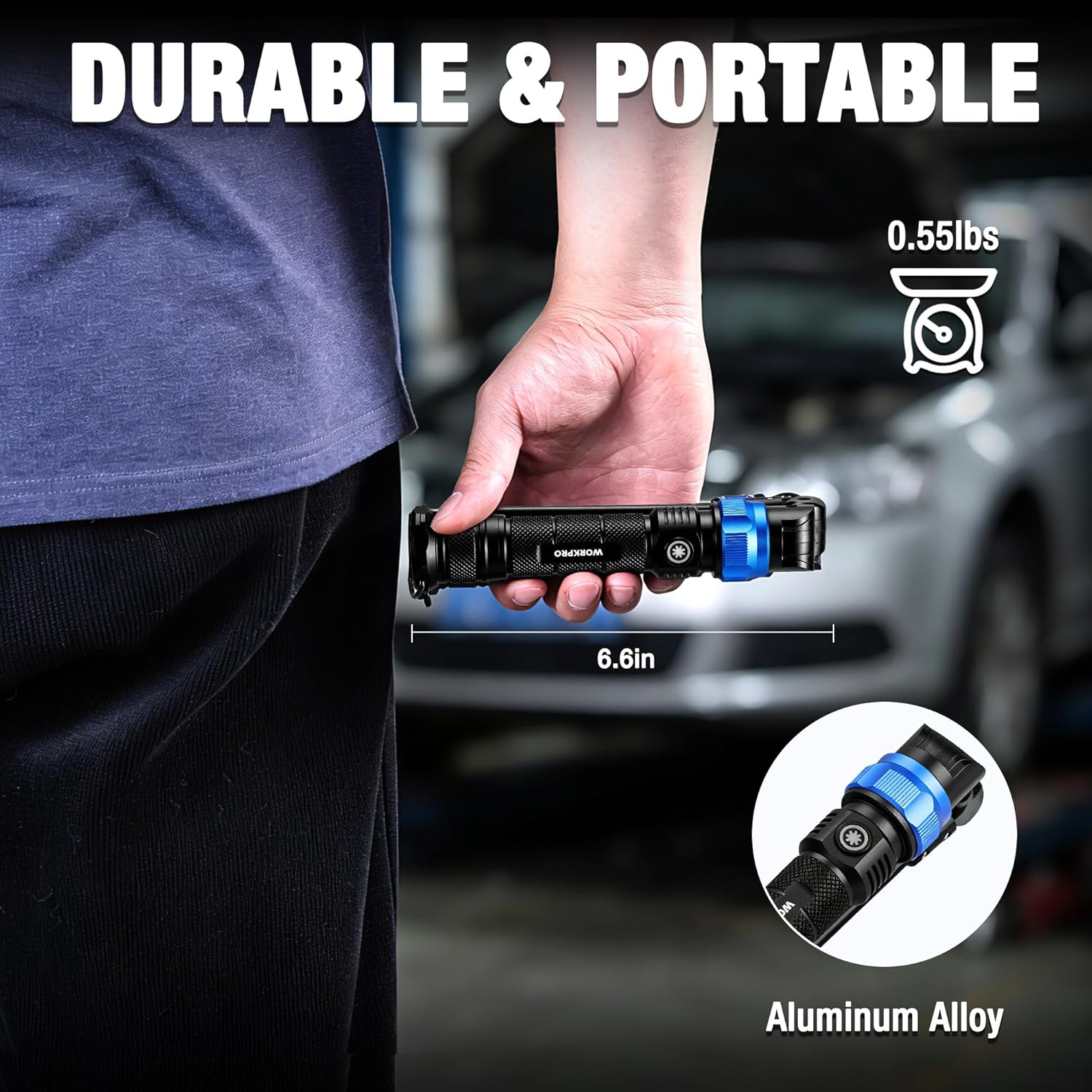 Compact rechargeable LED work light held in hand, with blue accent ring and textured grip.