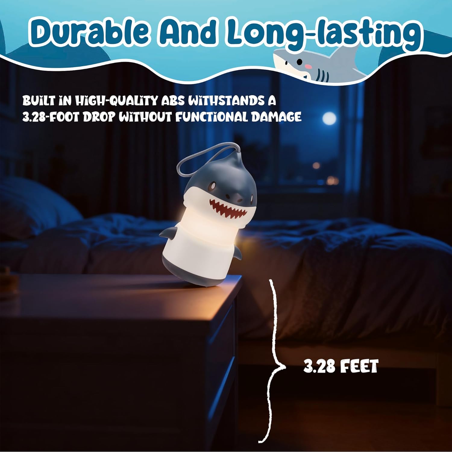 Blue shark lantern with white base and loop lanyard, glowing on a tabletop