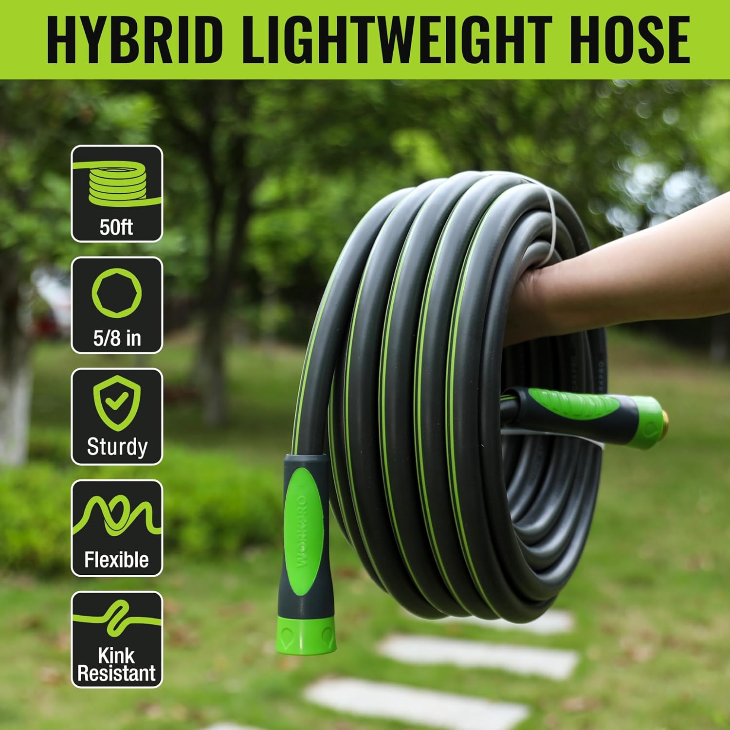 Coiled black garden hose with green end connector and gray outer covering