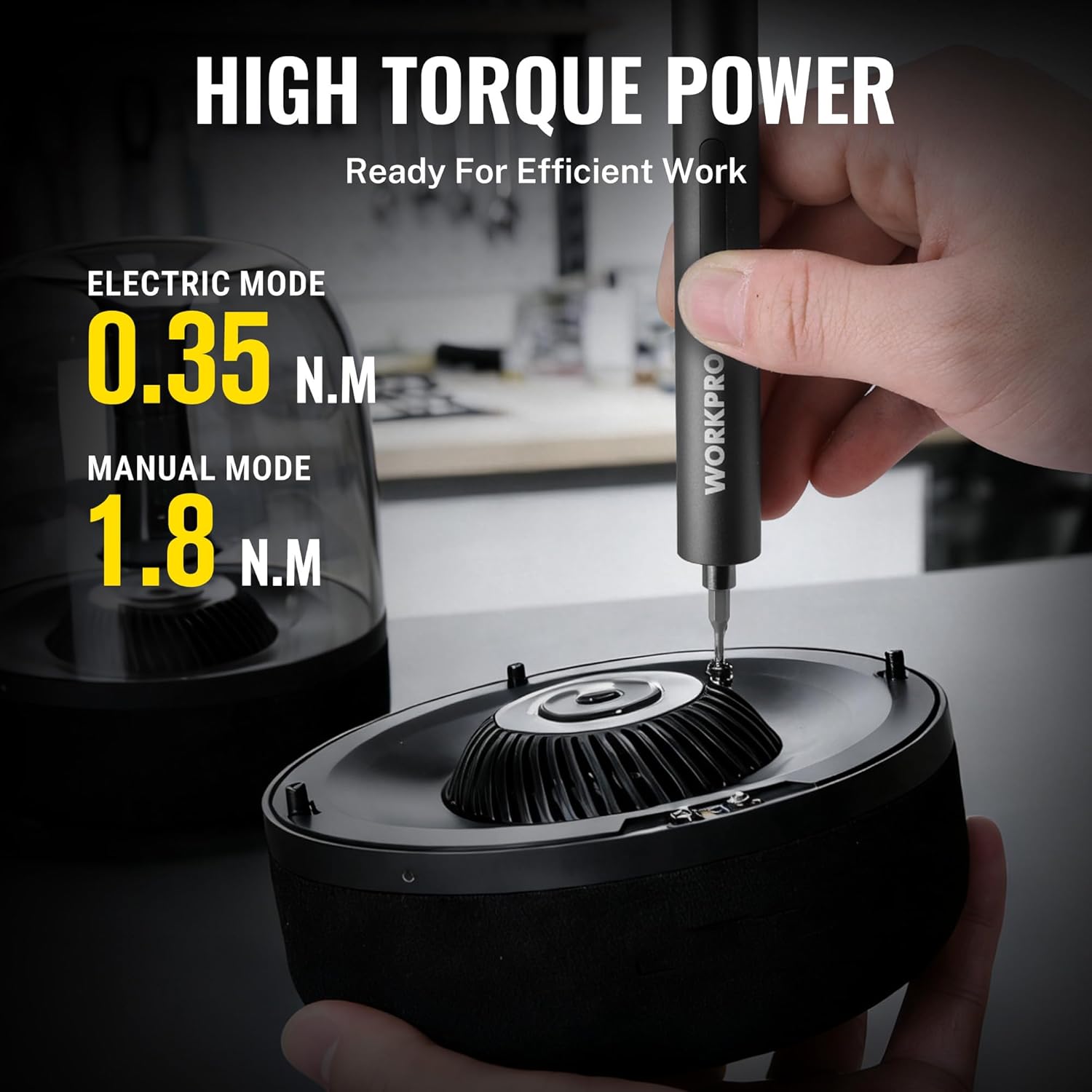Precision electric screwdriver held above a screw on a round component