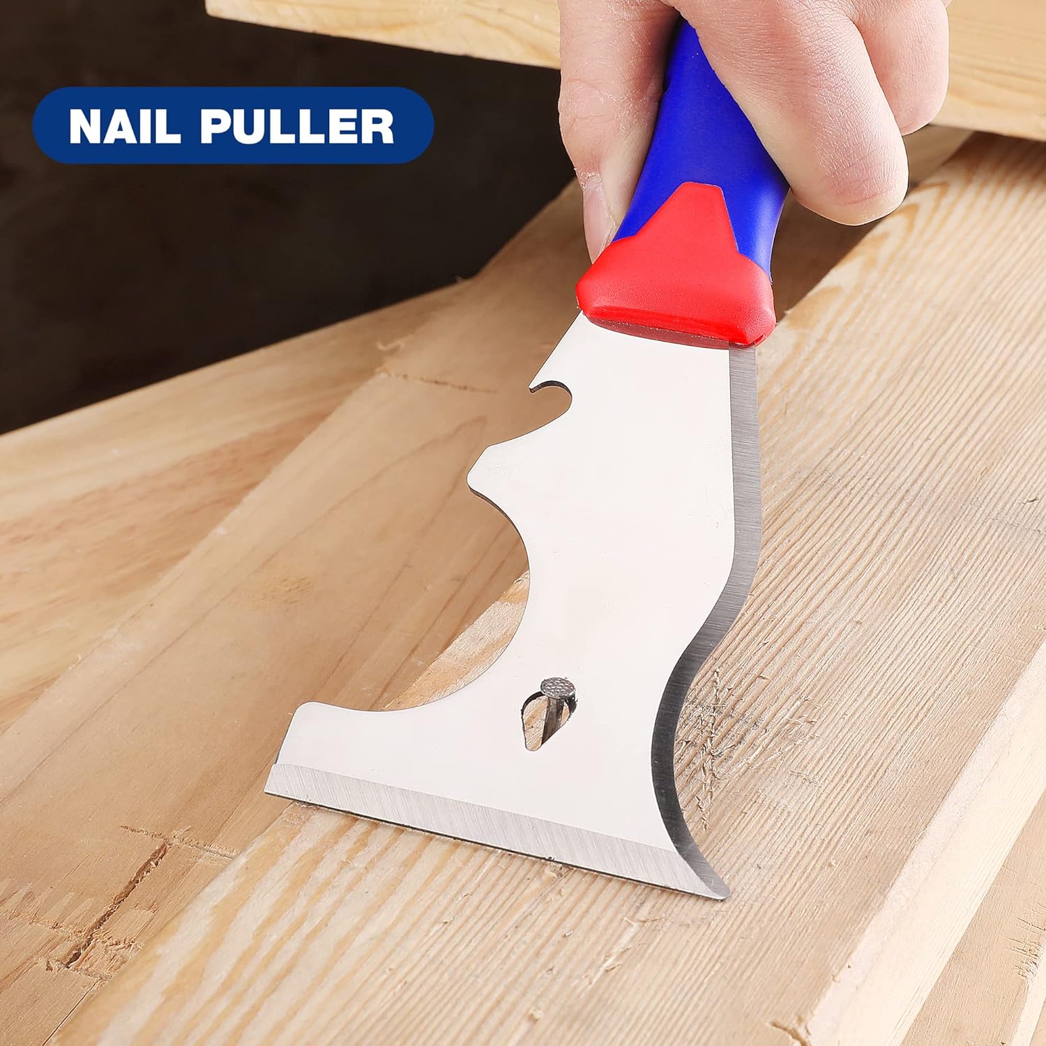 WORKPRO nail puller paint scraper tool with red handle, stainless blade on wood