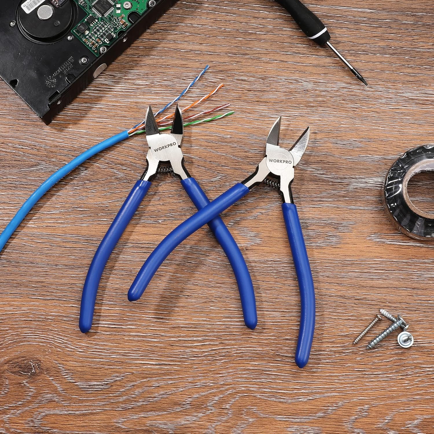 WORKPRO 2-pack precision cutting pliers with blue grips on a wooden workbench