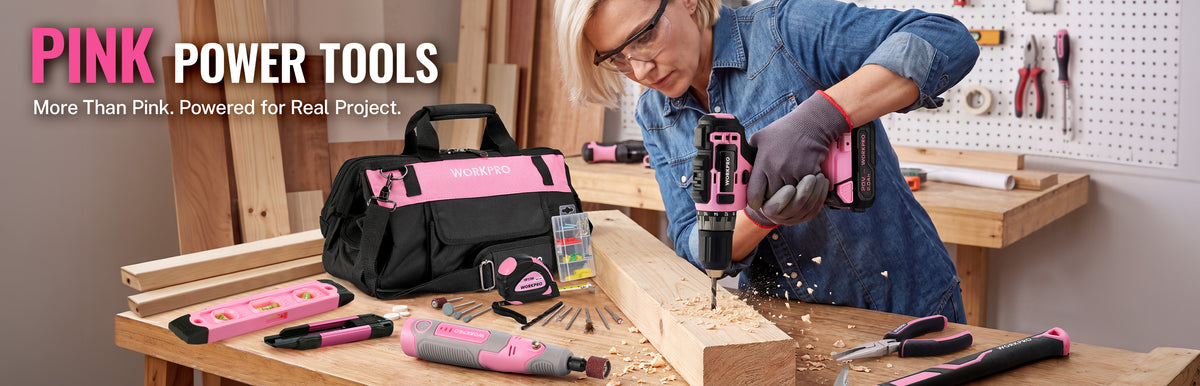 Pink power tools and tool bag on a workshop bench, with a person drilling wood and tools arranged on a pegboard