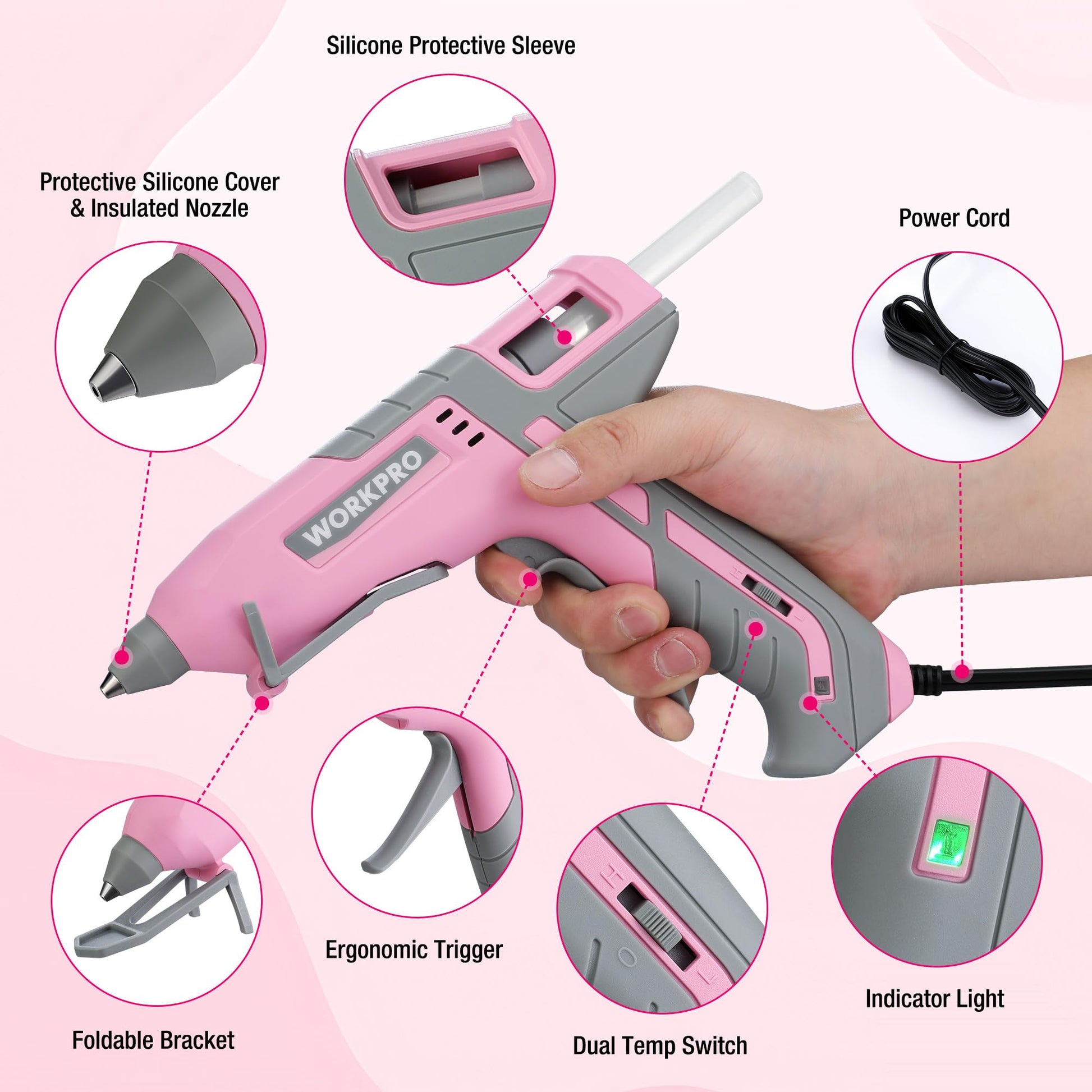 Pink and grey hot glue gun with power cord, silicone nozzle cover, and dual temp switch.