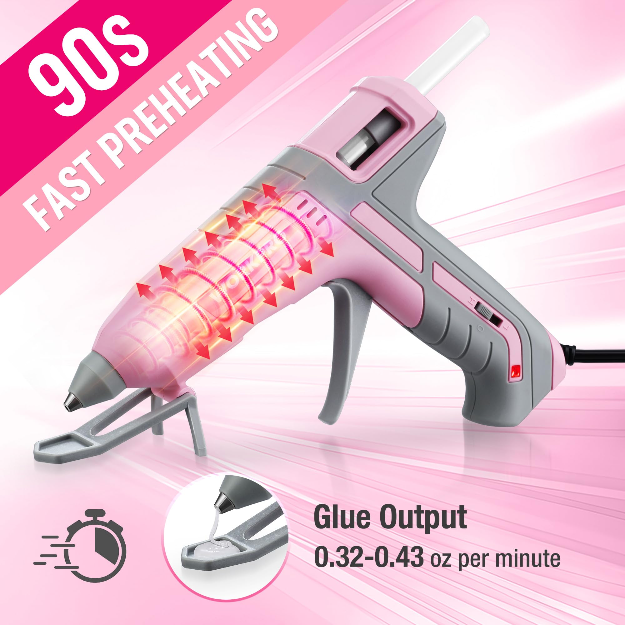 Pink and grey hot glue gun with green stand, clear nozzle, and heat output glow.