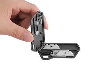 Ceramic safety box cutter opened to show inner blade compartment