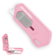 Pink ceramic blade safety box cutter, angled view with open base and blade