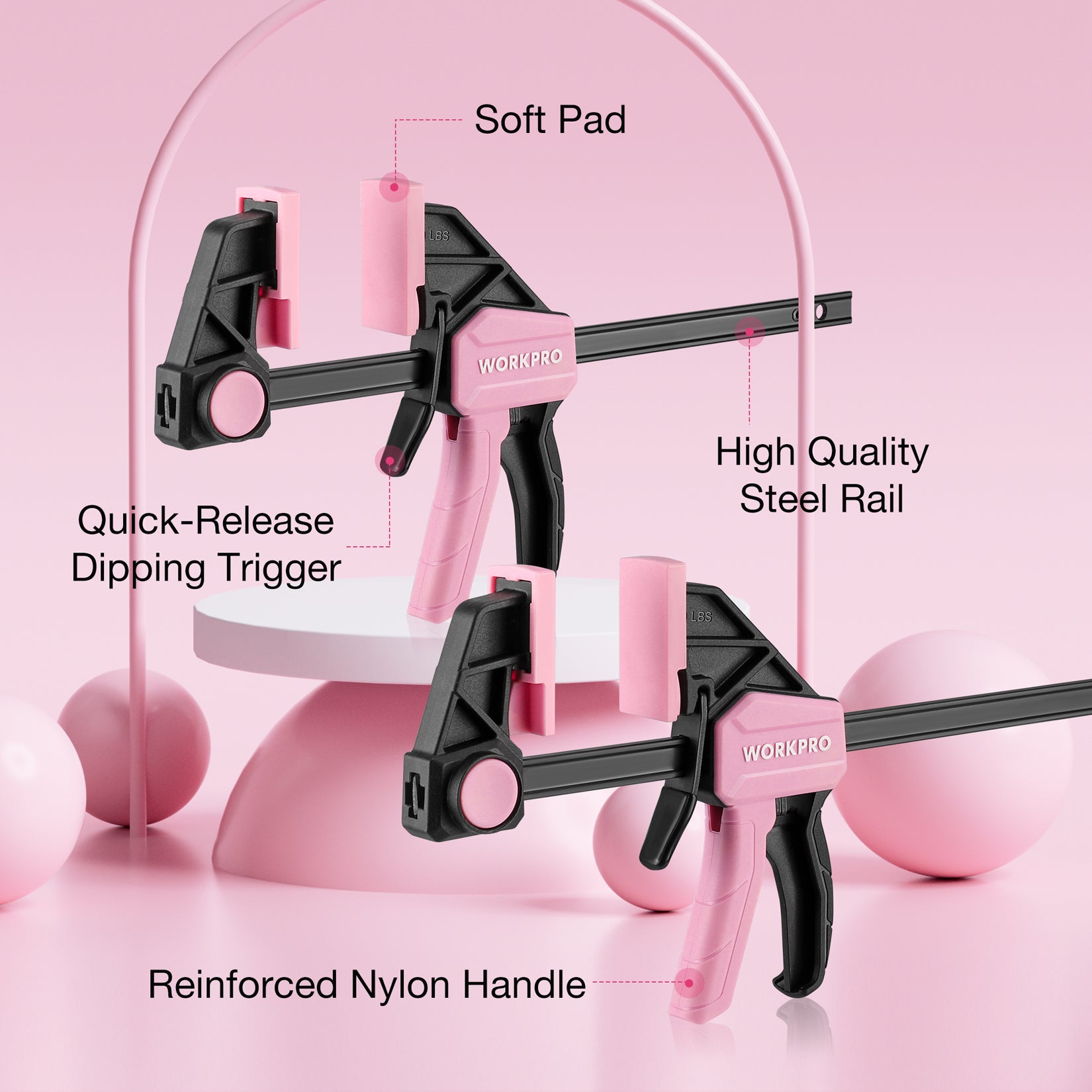 Pink bar clamp with soft pad, quick-release trigger, reinforced nylon handle, steel rail