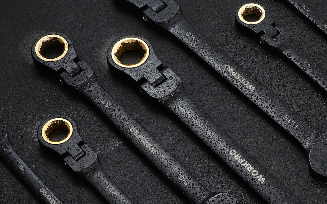 Wrench set with round gold openings on black, water beaded metal, showing innovation and quality in secure tools