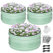 Green raised garden bed set with layered steel panels, filled with purple flowers.