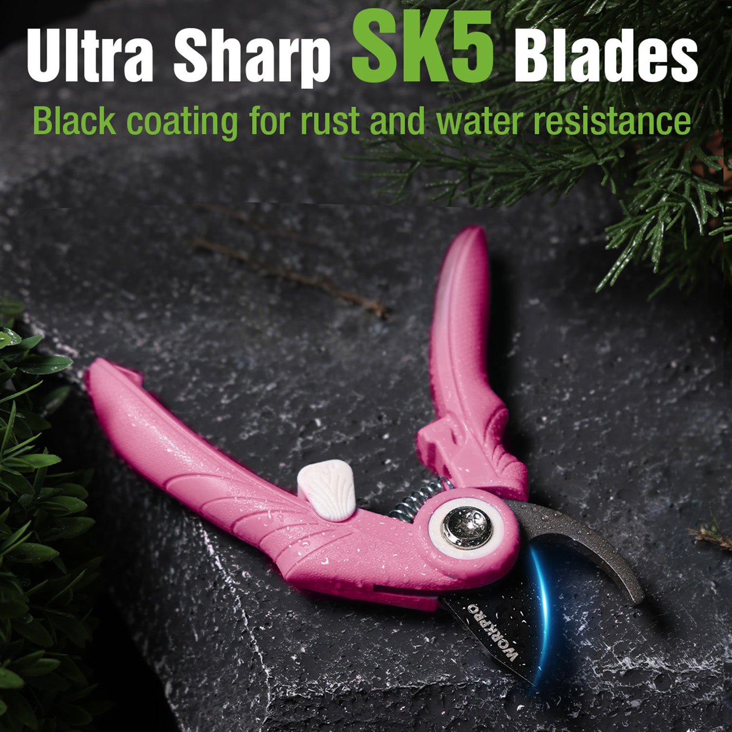 Pink and black garden pruning shears with bypass cutting blade, close-up