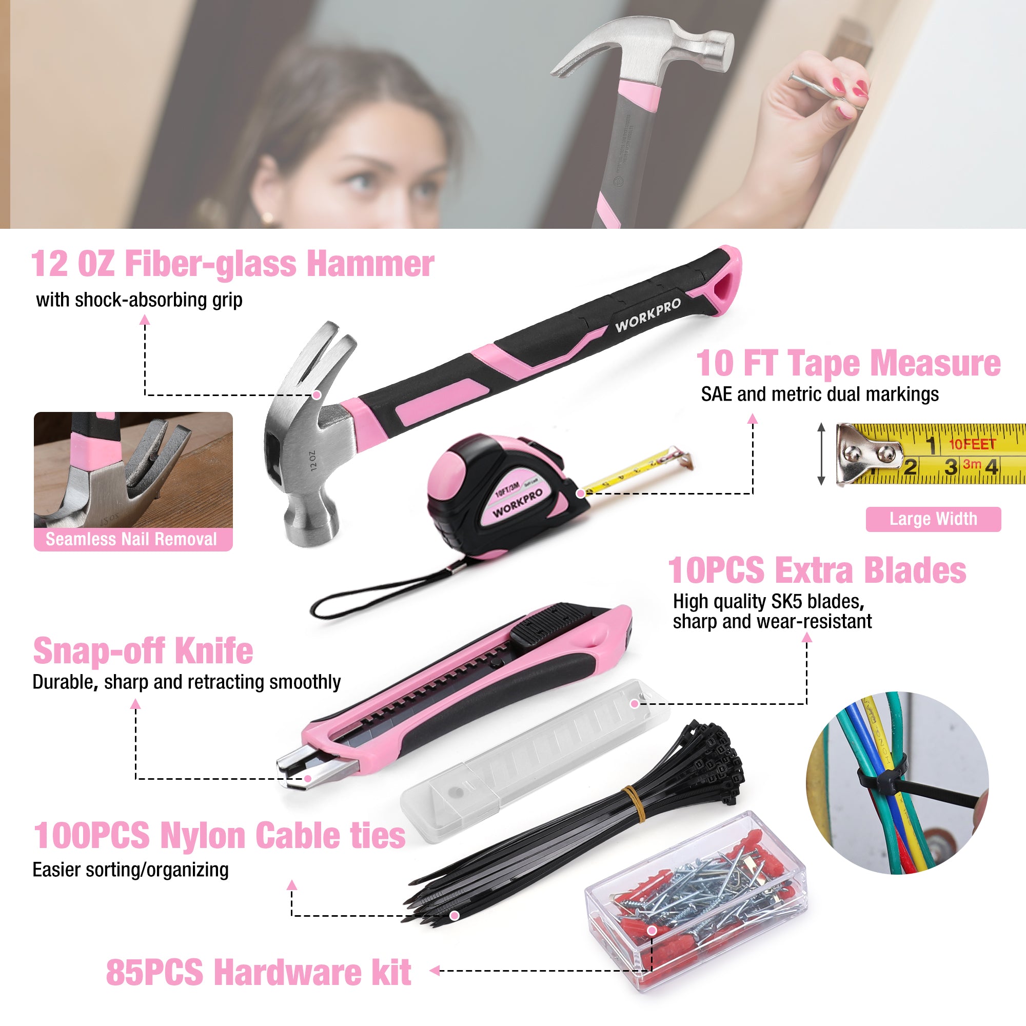 Pink and black household tool set hand tools: hammer, tape measure, snap-off knife, blades