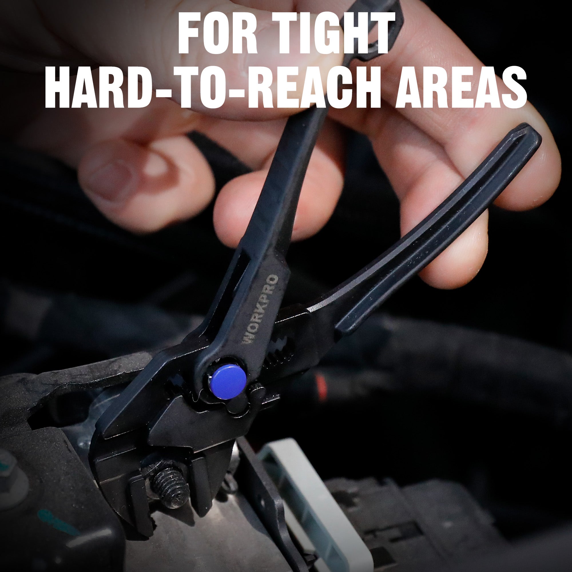 WORKPRO mini adjustable pliers wrench in tight space, black jaws and blue control knob