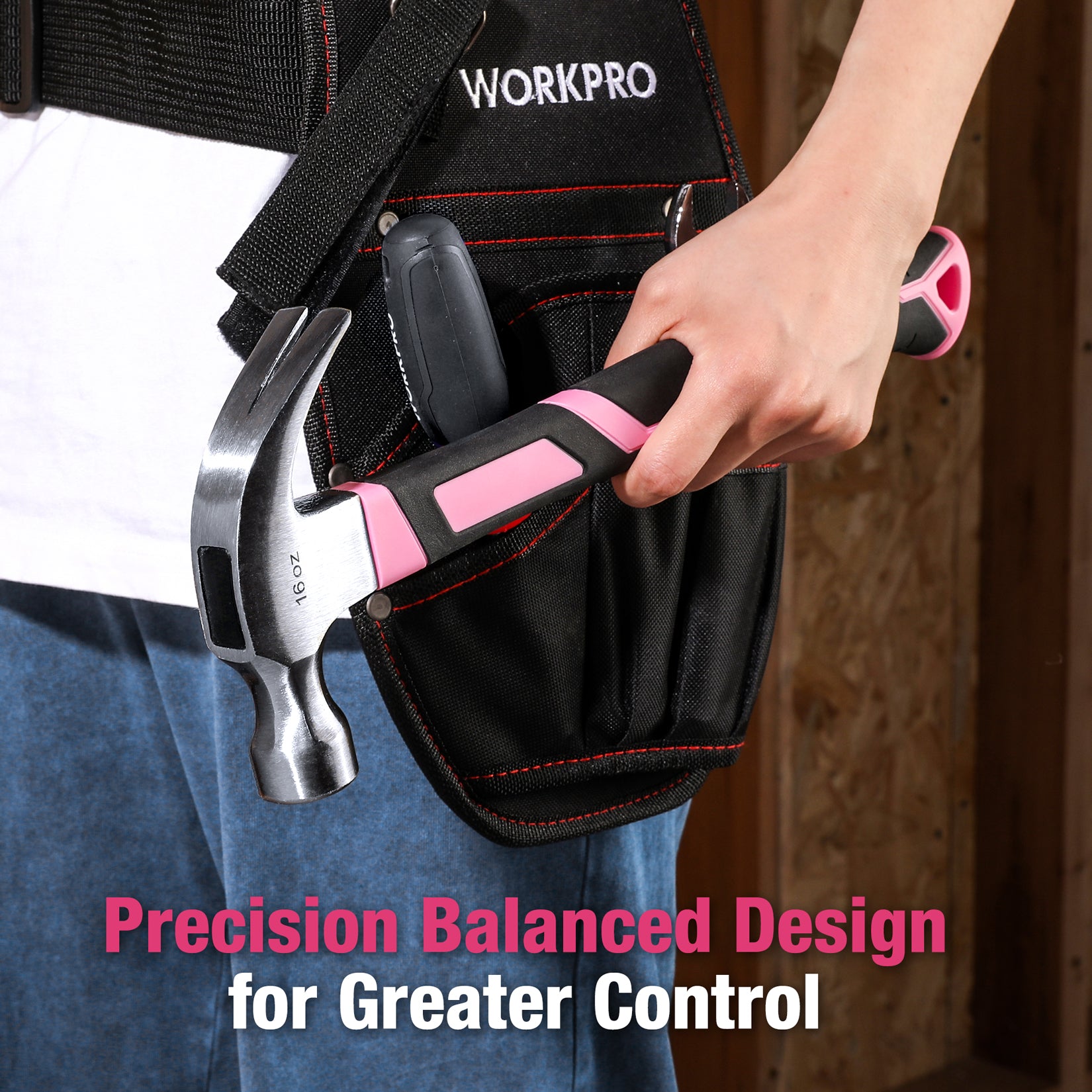 Hand holding claw hammer with black-and-pink fiberglass handle and steel head