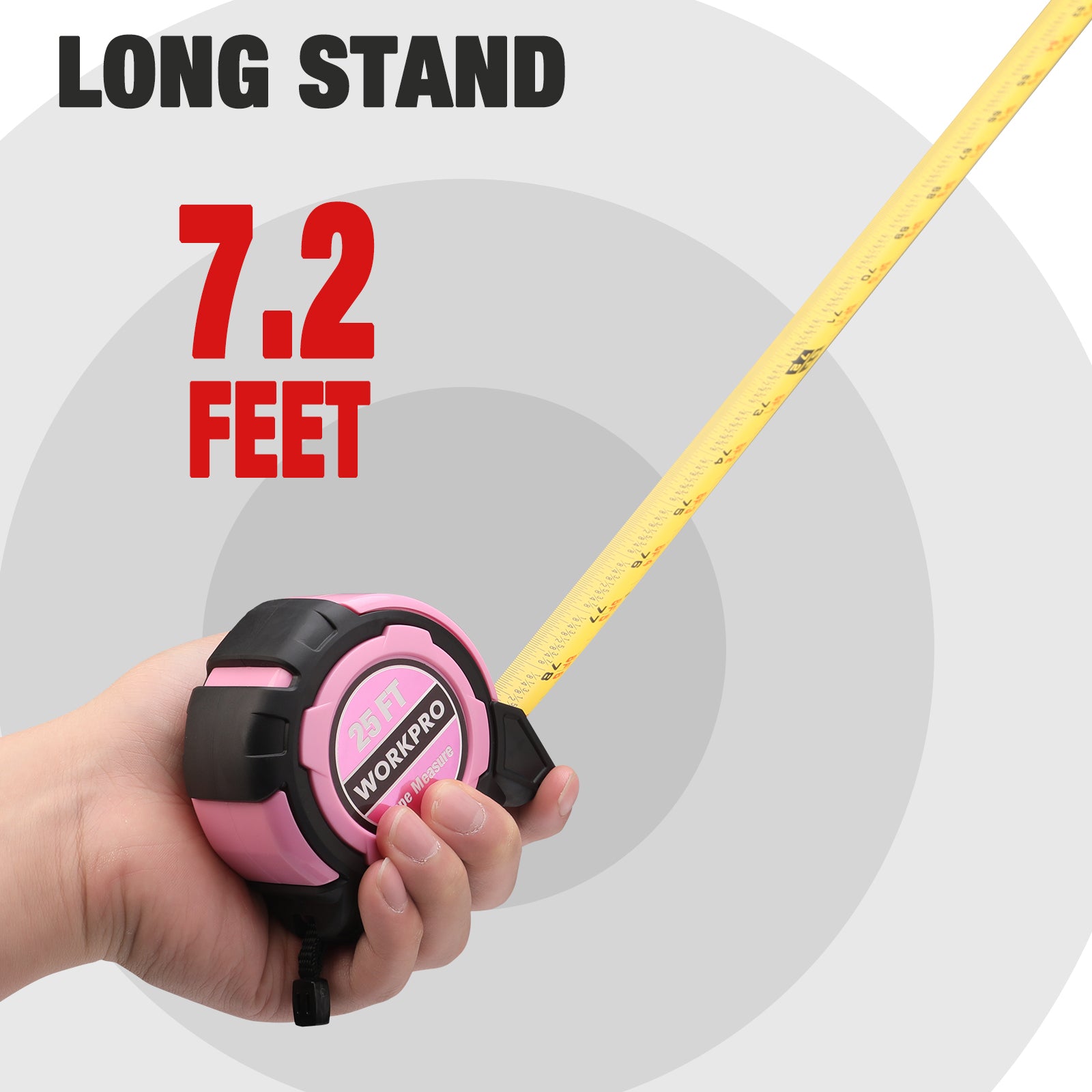 Pink retractable tape measure held in hand, compact 25 ft case