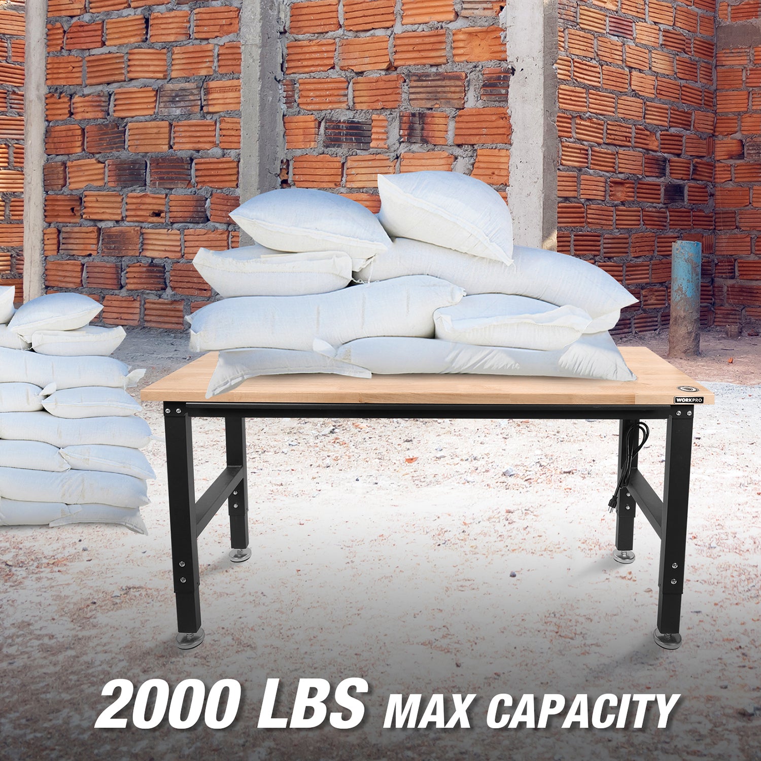 Adjustable workbench with hardwood top supporting a heavy sandbag load