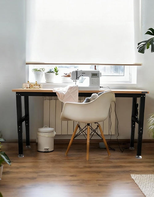 Home sewing station with a white sewing machine, innovation and quality shown in the tidy workspace