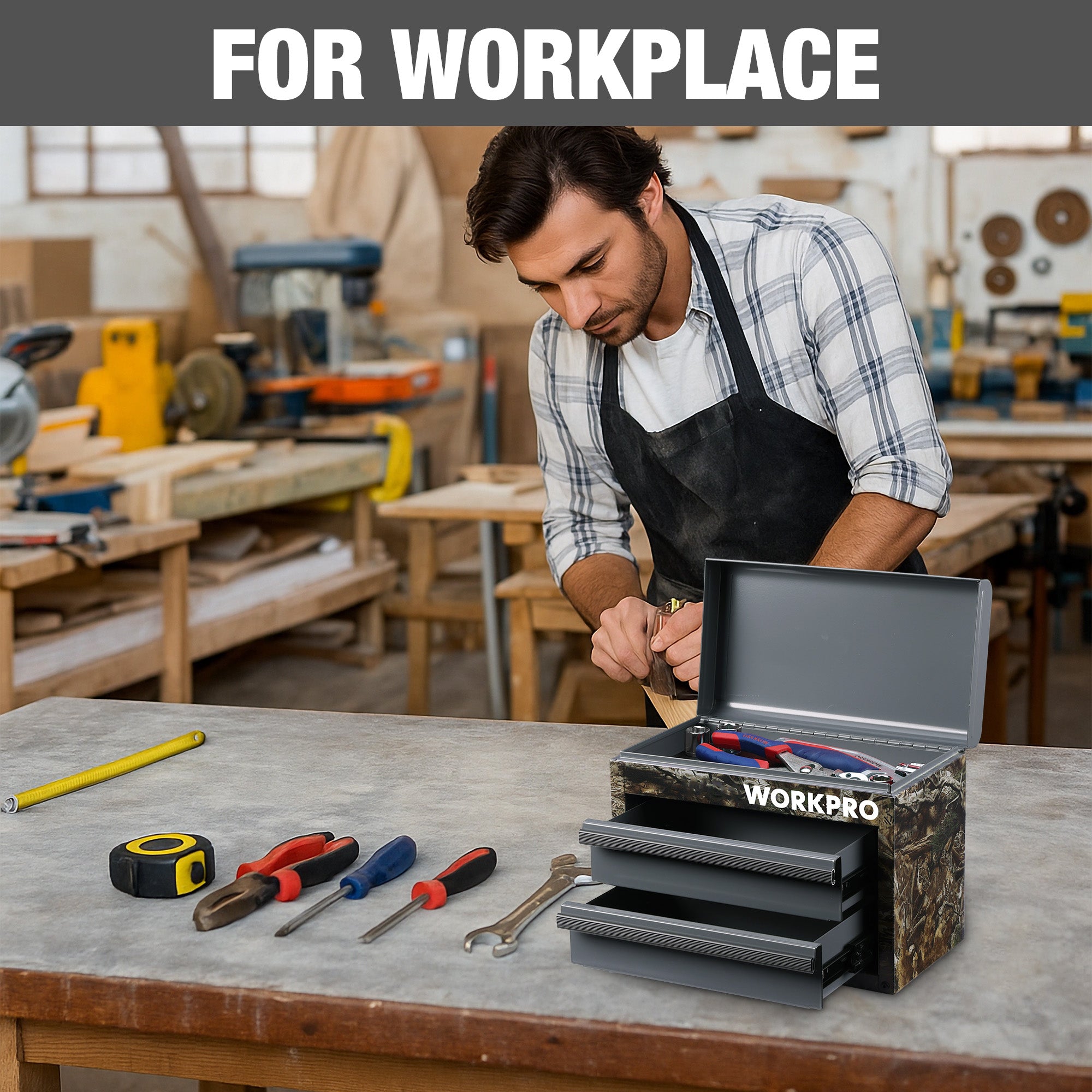 Camouflage green mini metal toolbox open on workbench with two sliding drawers