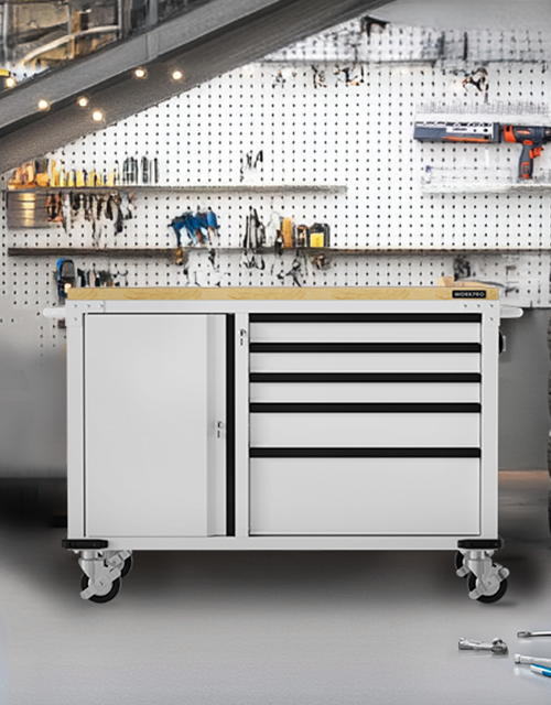 Metal tool cabinet on wheels in a workshop, with drawers and pegboard wall, showing innovation and quality