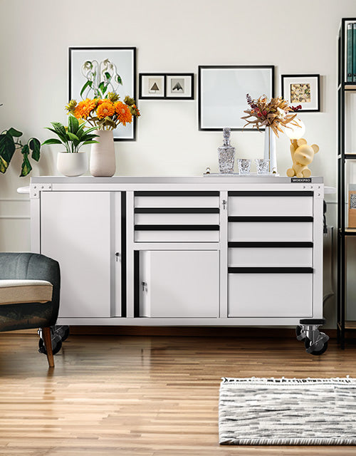 Modern cabinet with drawers and flowers on top, innovation and quality in a bright living room