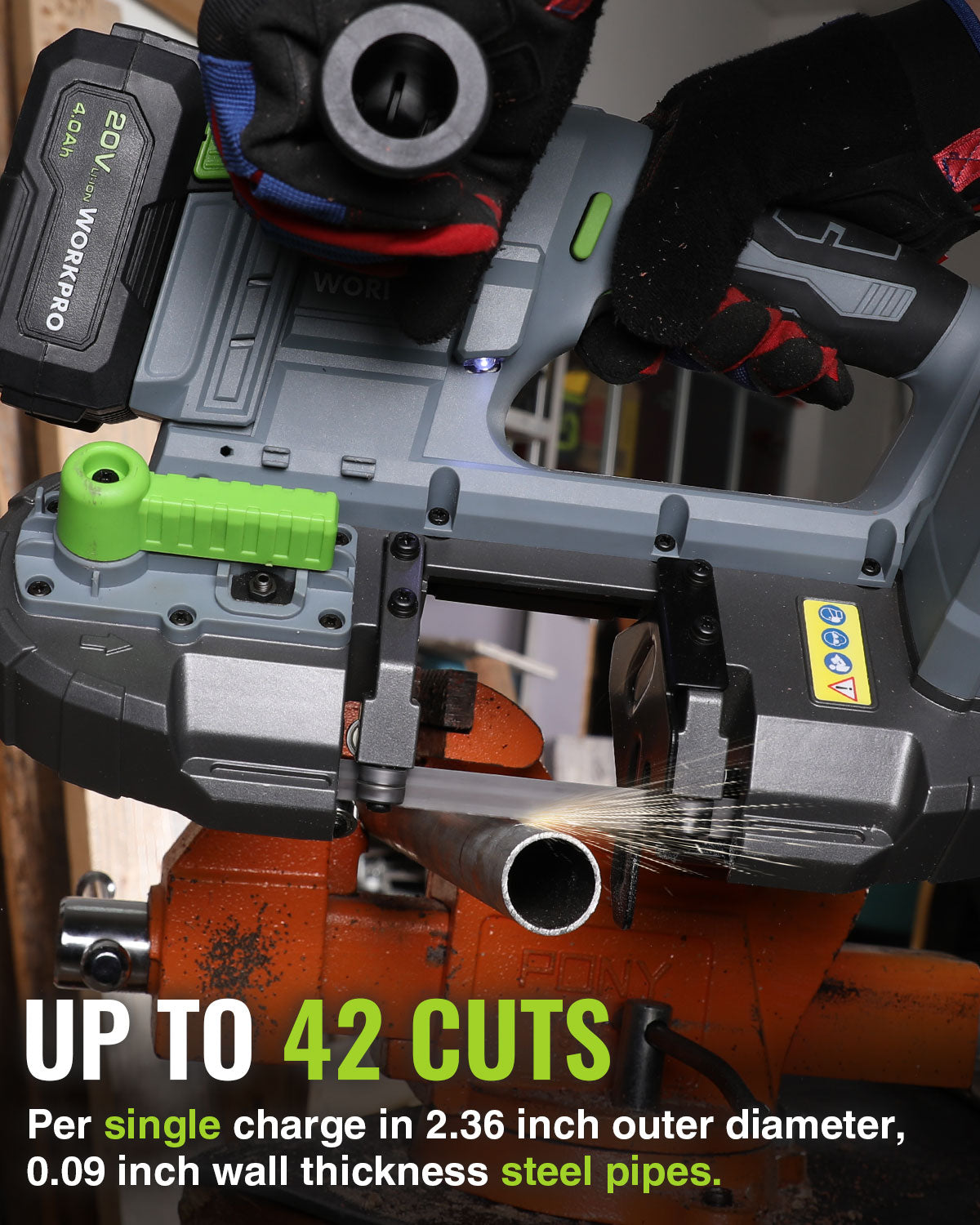 Band saw blade guide cutting an orange steel pipe, with green depth lever