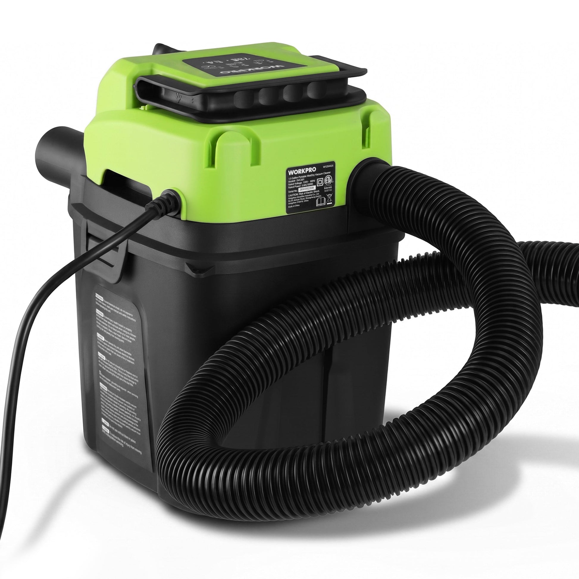 Green and black portable wet/dry vacuum with coiled hose and side vacuum outlet.