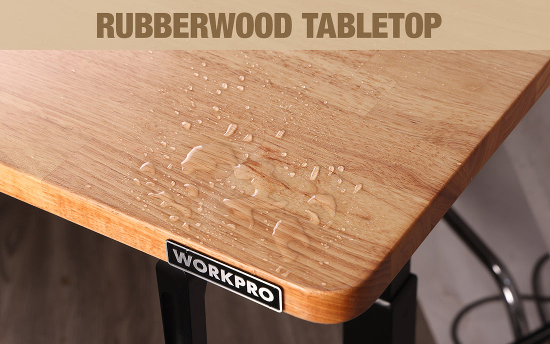 Rubberwood tabletop with water droplets on the surface and visible grain, showing durable quality and innovation