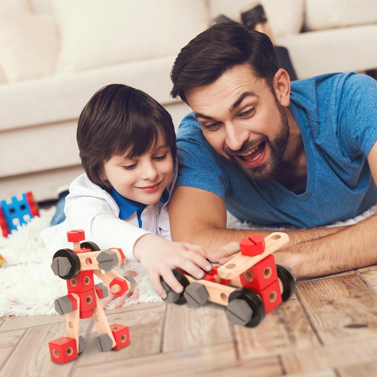Workpro 70 piece wooden building toy tool kit in red with a wrench, screwdriver, saw, hammer, and drill.