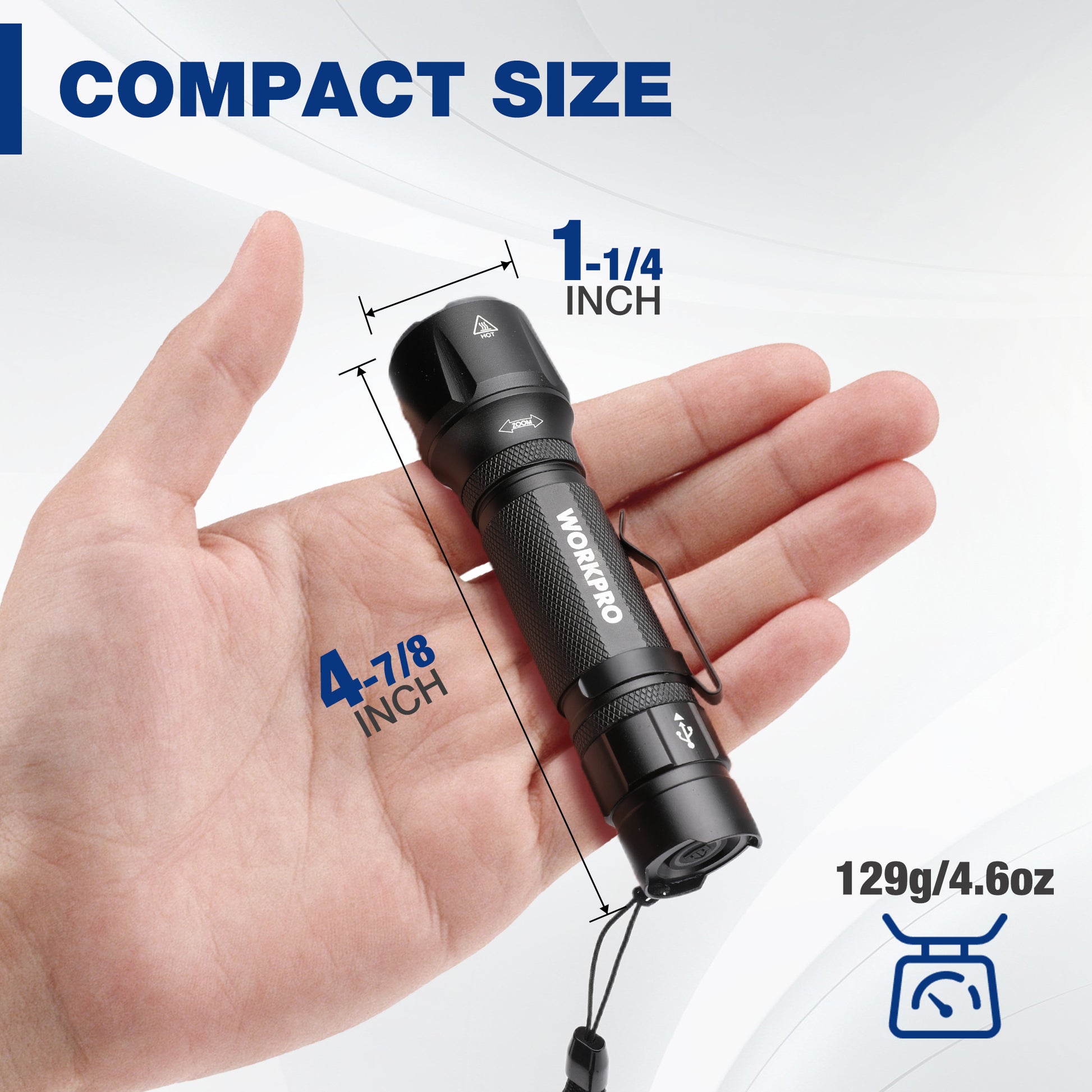 Compact tactical flashlight with textured grip, pocket clip, and attached lanyard