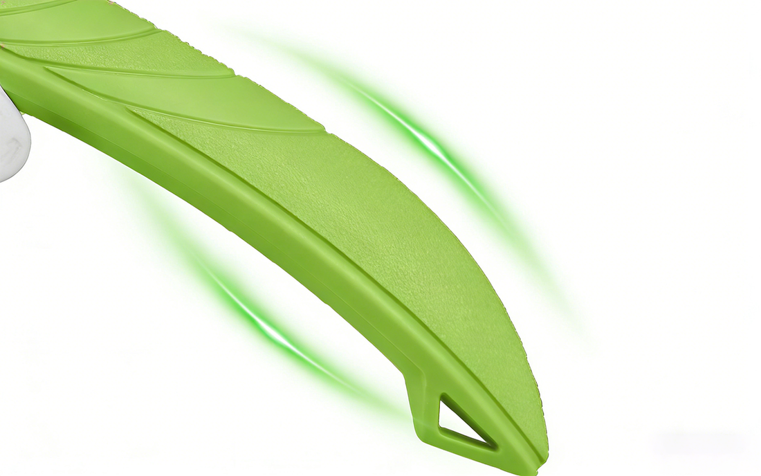 Green plastic tool handle with textured grip and cutout near the end on a white background
