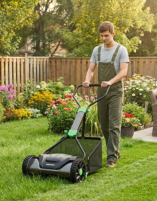 Man using a lawn mower in a green garden with flowers, showing innovation and quality in yard care