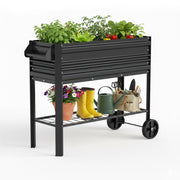 Black raised galvanized garden bed with legs and two front wheels, open top