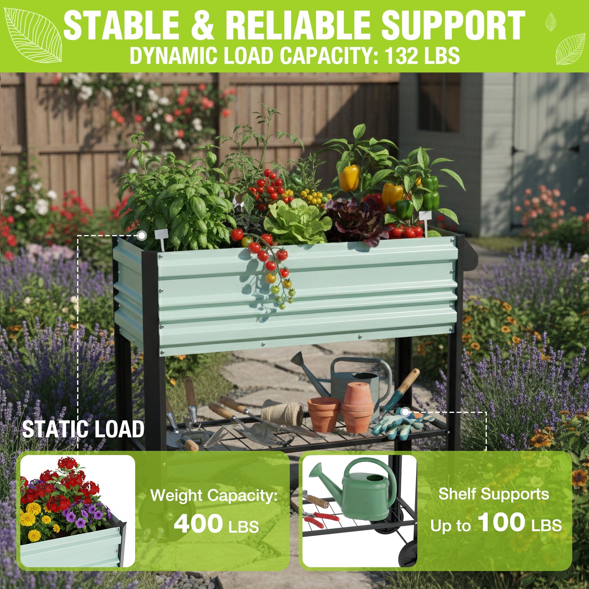 Green raised garden bed with wheels and lower shelf, packed with plants and gardening tools