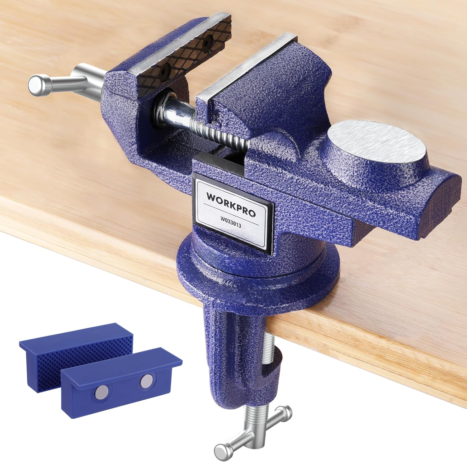 WORKPRO blue bench vise clamp with swivel base and textured jaw pads on workbench