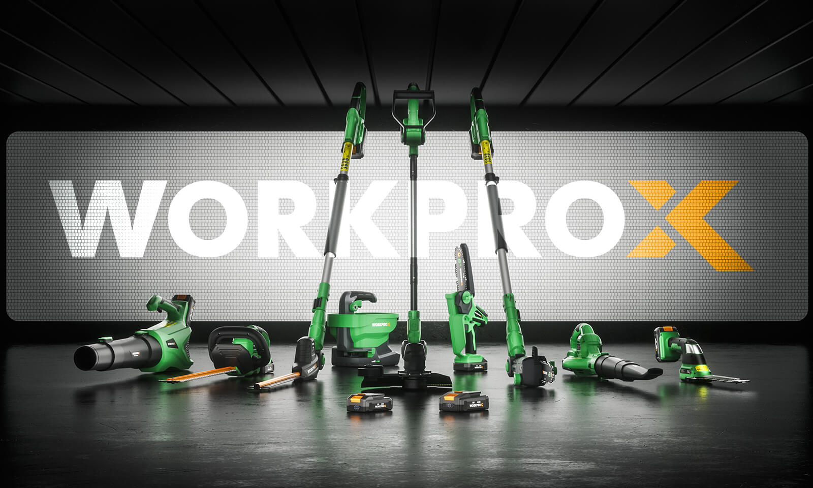 Green power tools and batteries arranged on a dark floor in front of a WORKPROX wall graphic