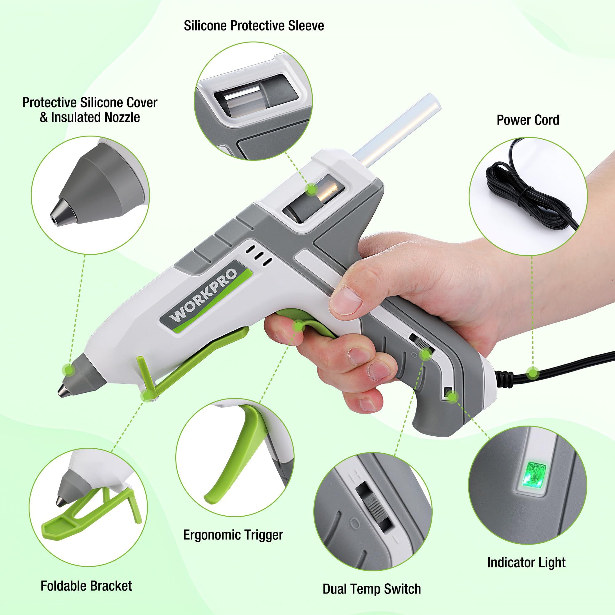 Pink and grey hot glue gun with labeled parts, silicone nozzle cover, and power cord.